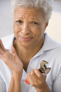 Woman Holding Wrench