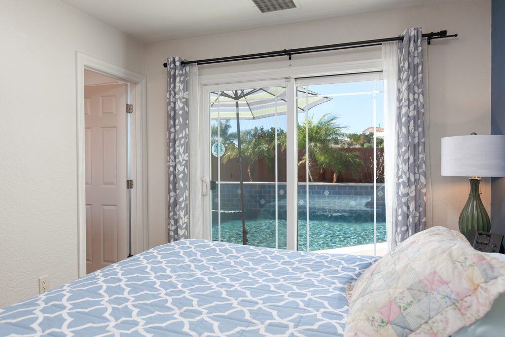 3970 Mount Albertine Way - Bedroom Area and Sliding Doon to the Pool and Backyard Area