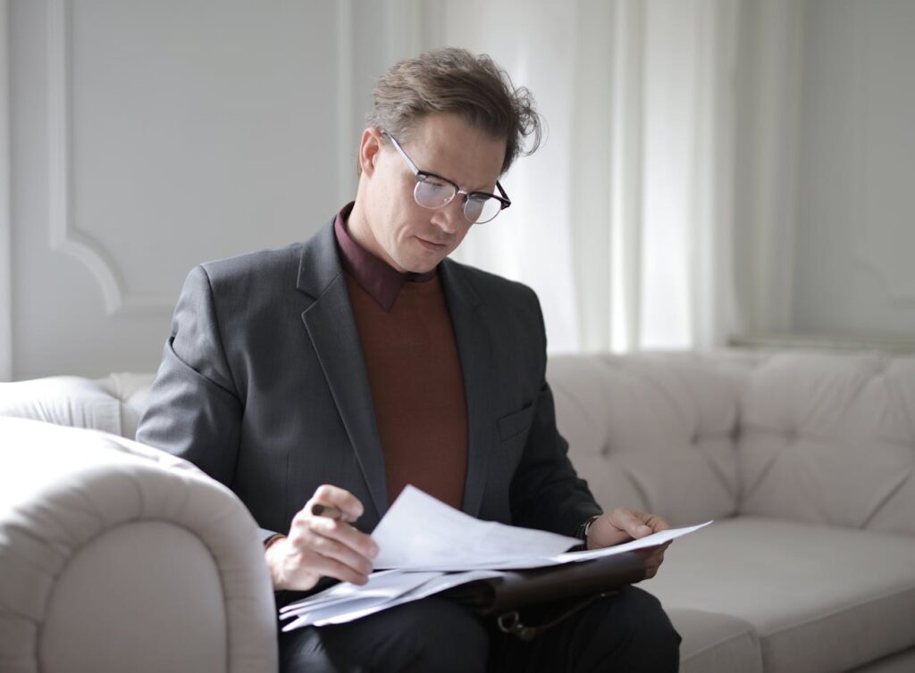 San Diego Home Offers - Man Reading Contracts