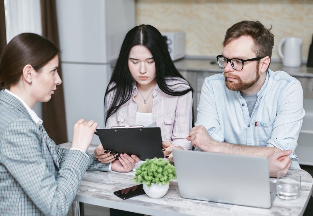 A Businesswoman Talking to Her Clients