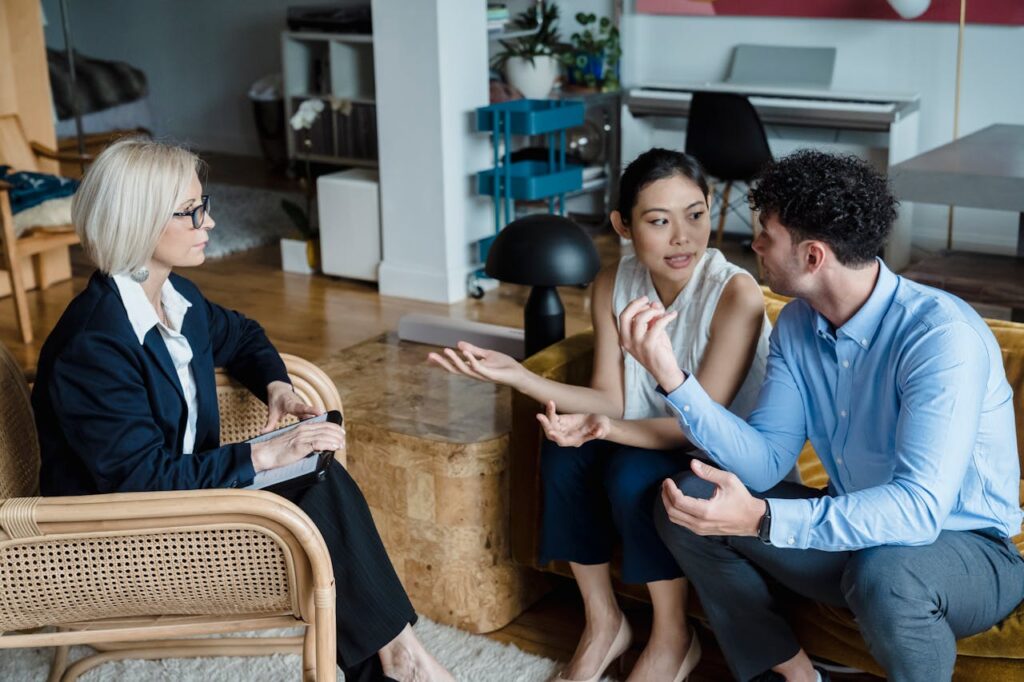 A Couple Having an Argument in Front of the Person Wearing Black Blazer