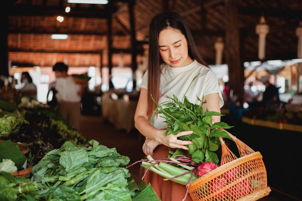 Woman with Basket Full of Fresh Produce